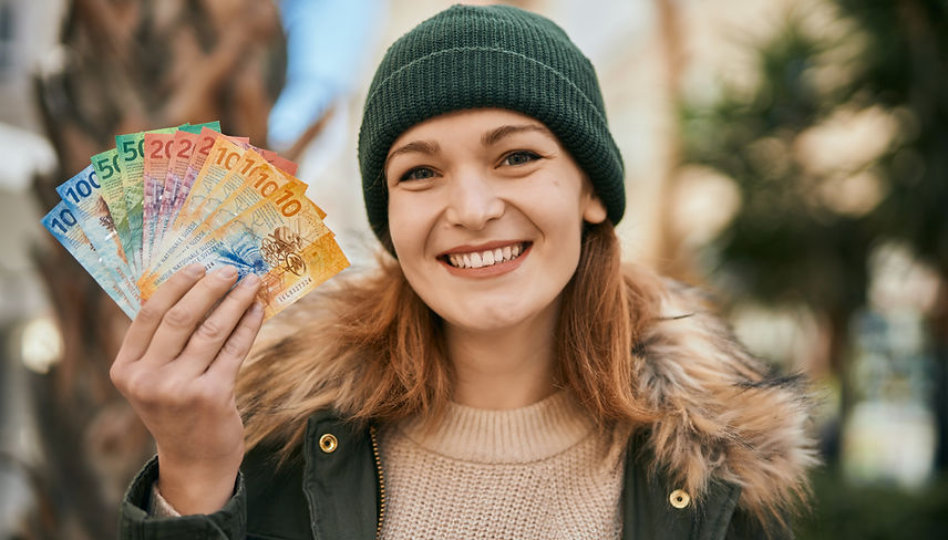 Woman holding money