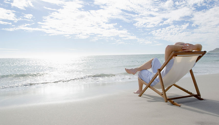 Man sitting in beach chair