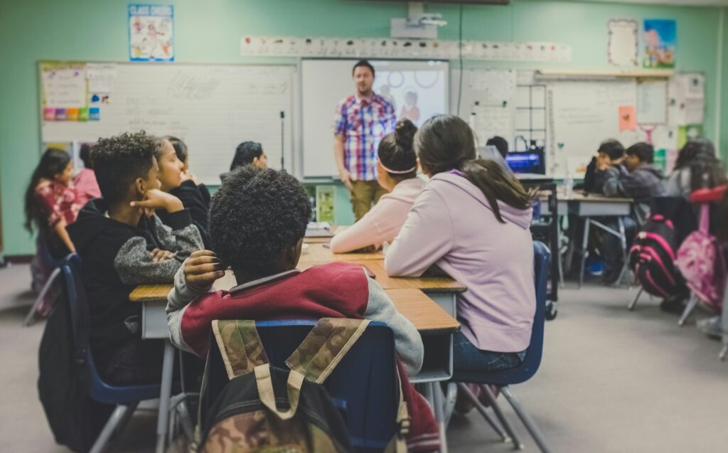 Teacher teaching teens about personal finance